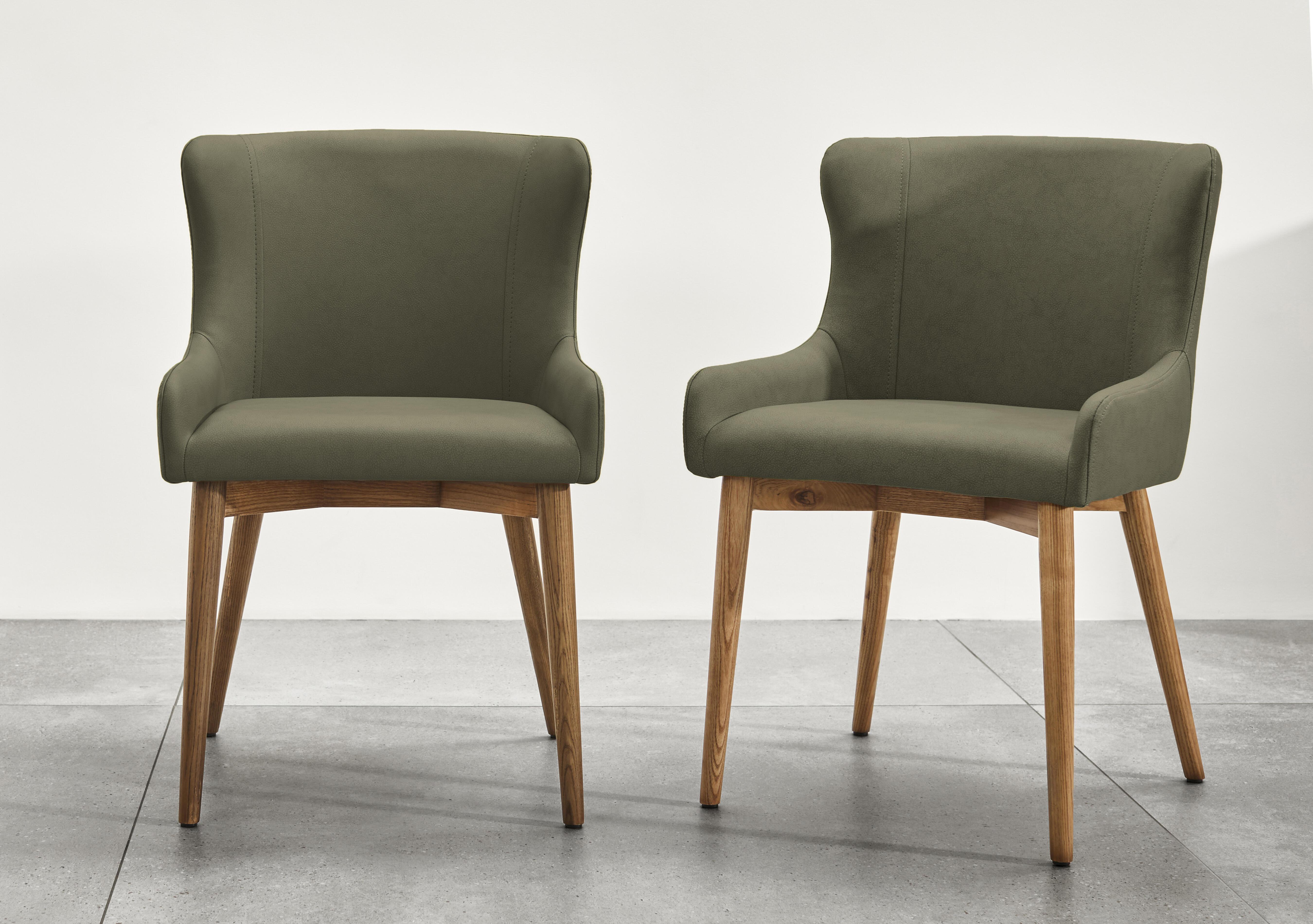 Sansa Set of 4 Faux Leather Dining Chairs with Wooden Legs in Green on Furniture Village