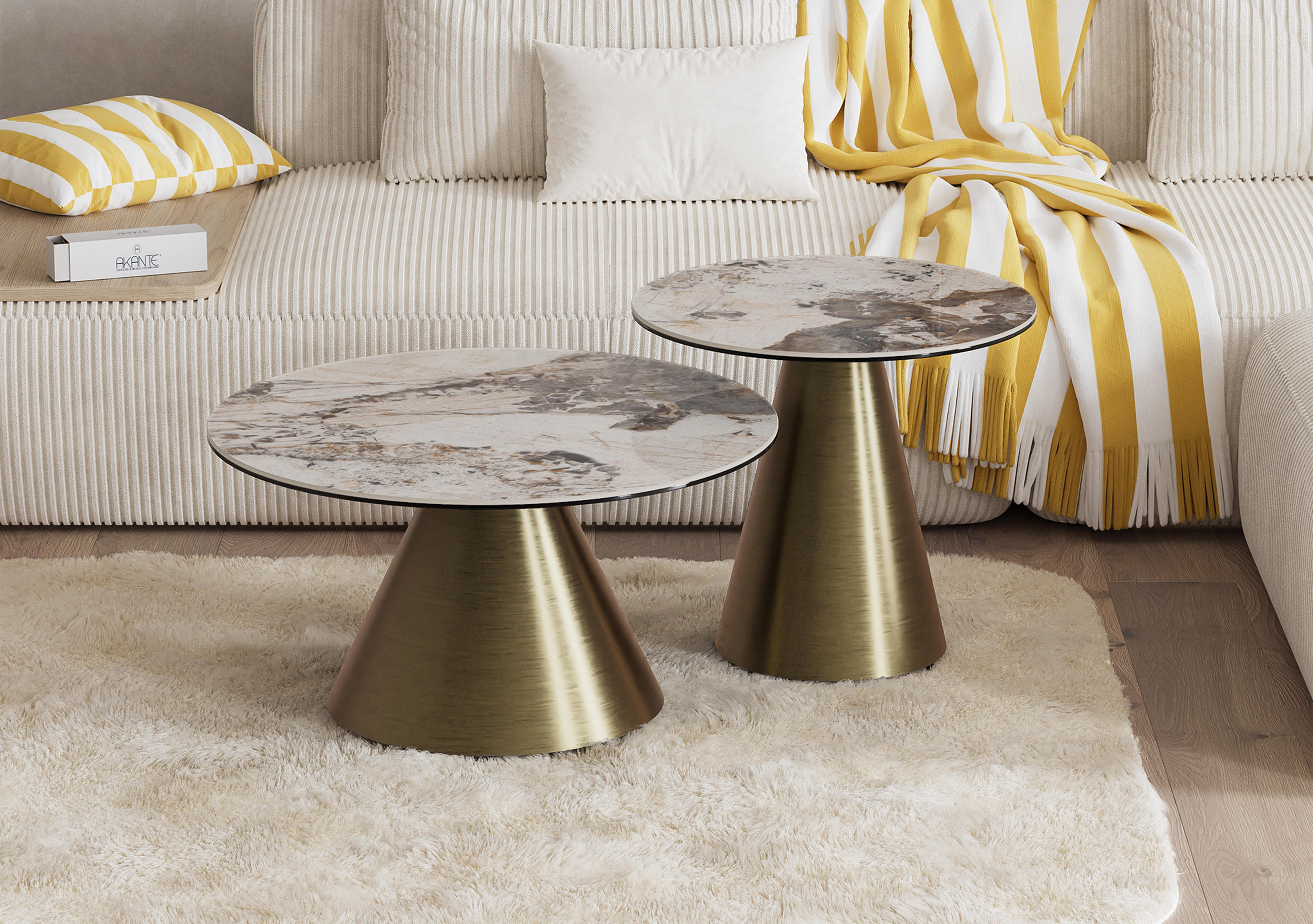 Amorim Round Coffee Table with Bronze Base in  on Furniture Village