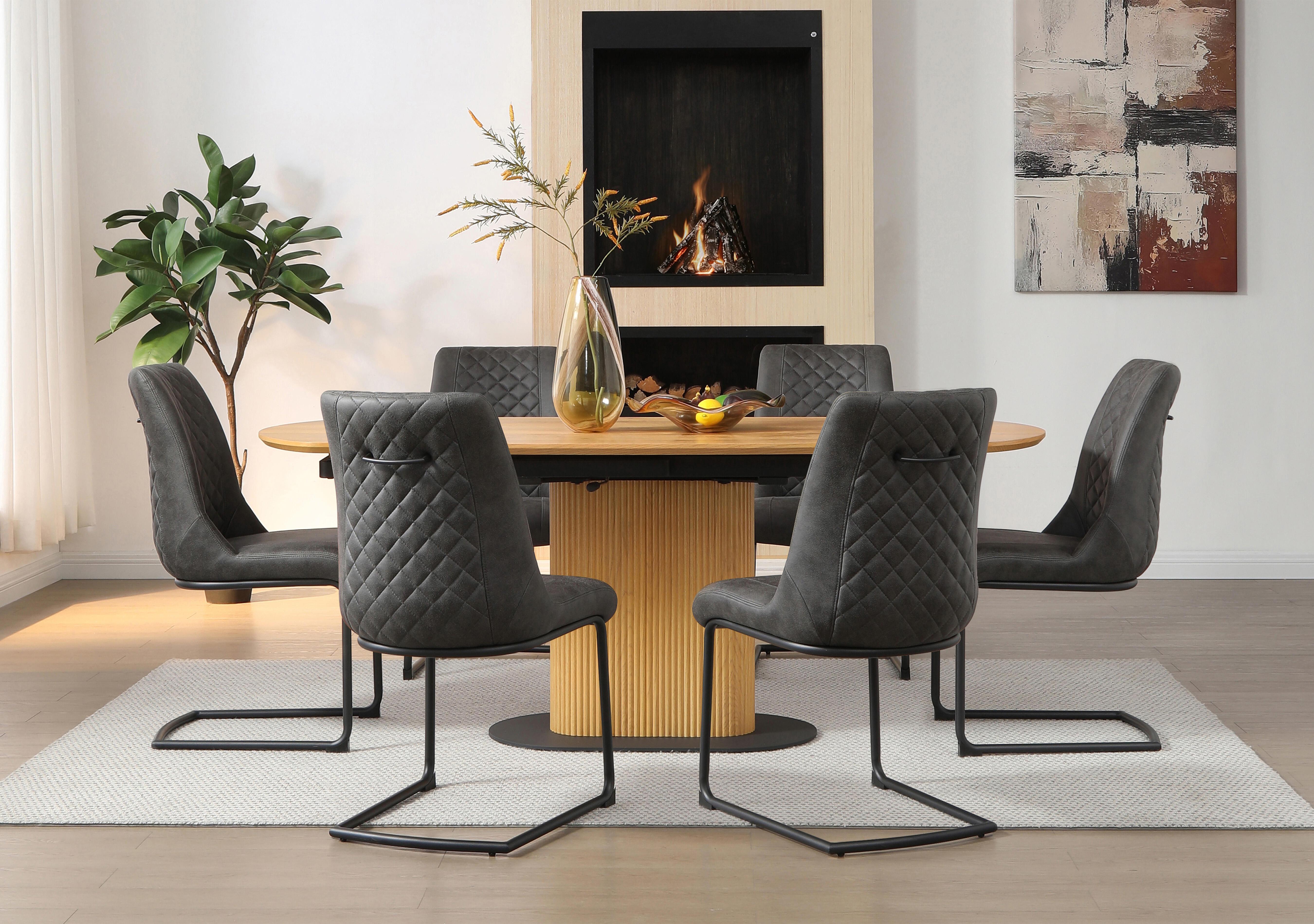 Jayden Swivel Extending Dining Table and 6 Faux Leather Cantilever Dining Chairs in  on Furniture Village