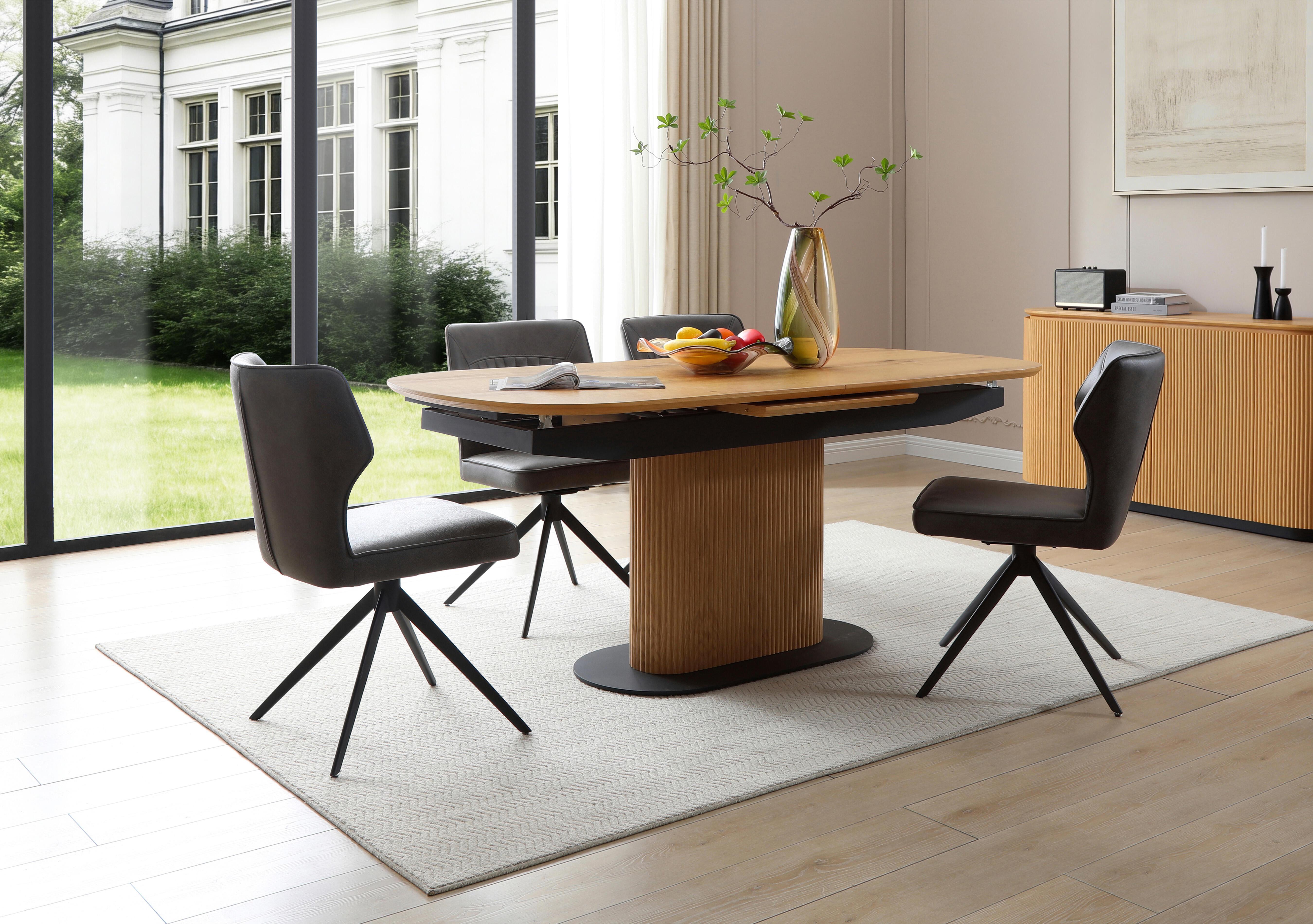 Jayden Pop Up Extending Dining Table and 4 Faux Leather Swivel Dining Chairs in  on Furniture Village