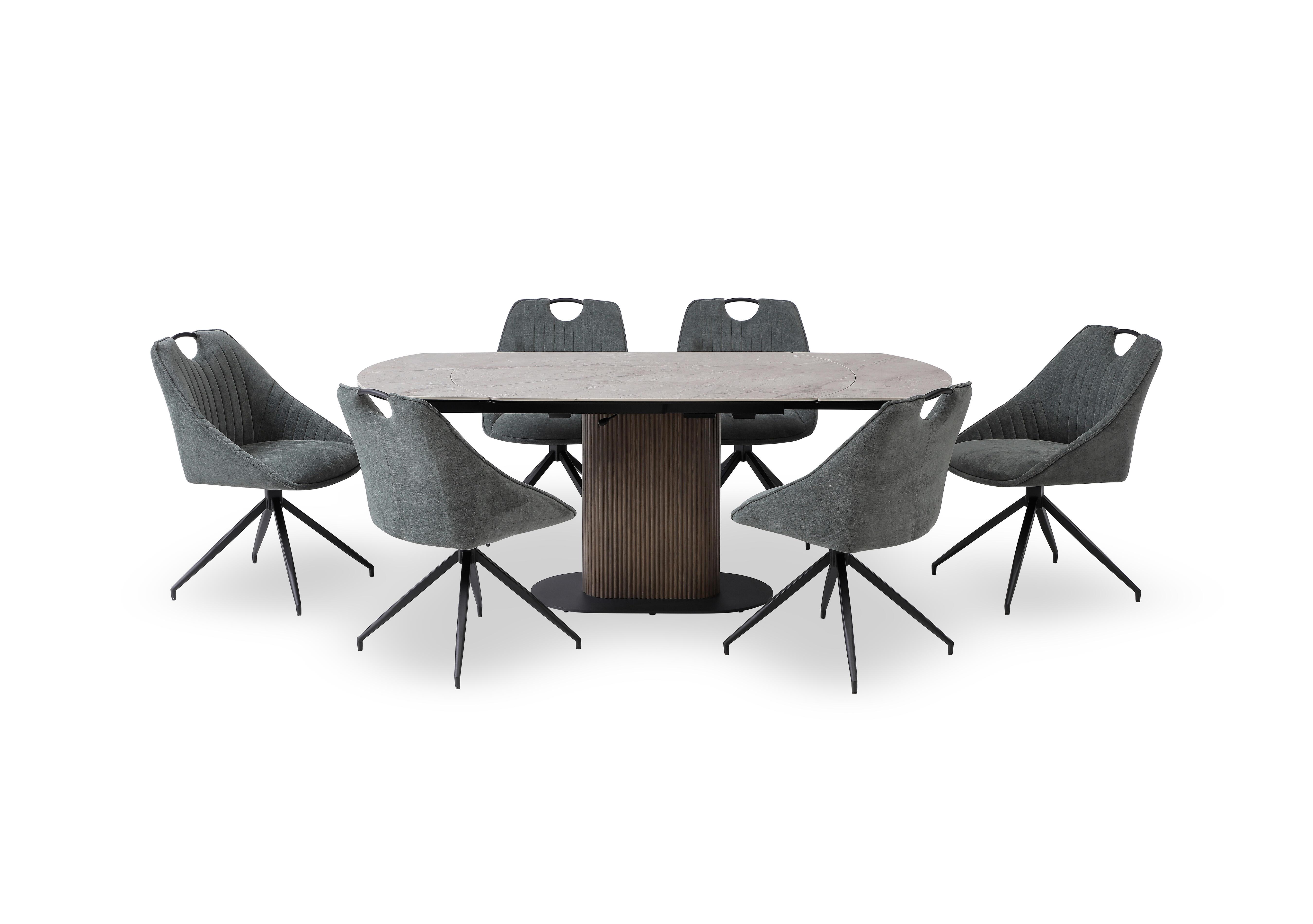 Petra Swivel Extending Dining Table and 6 Swivel Dining Chairs in Green on Furniture Village