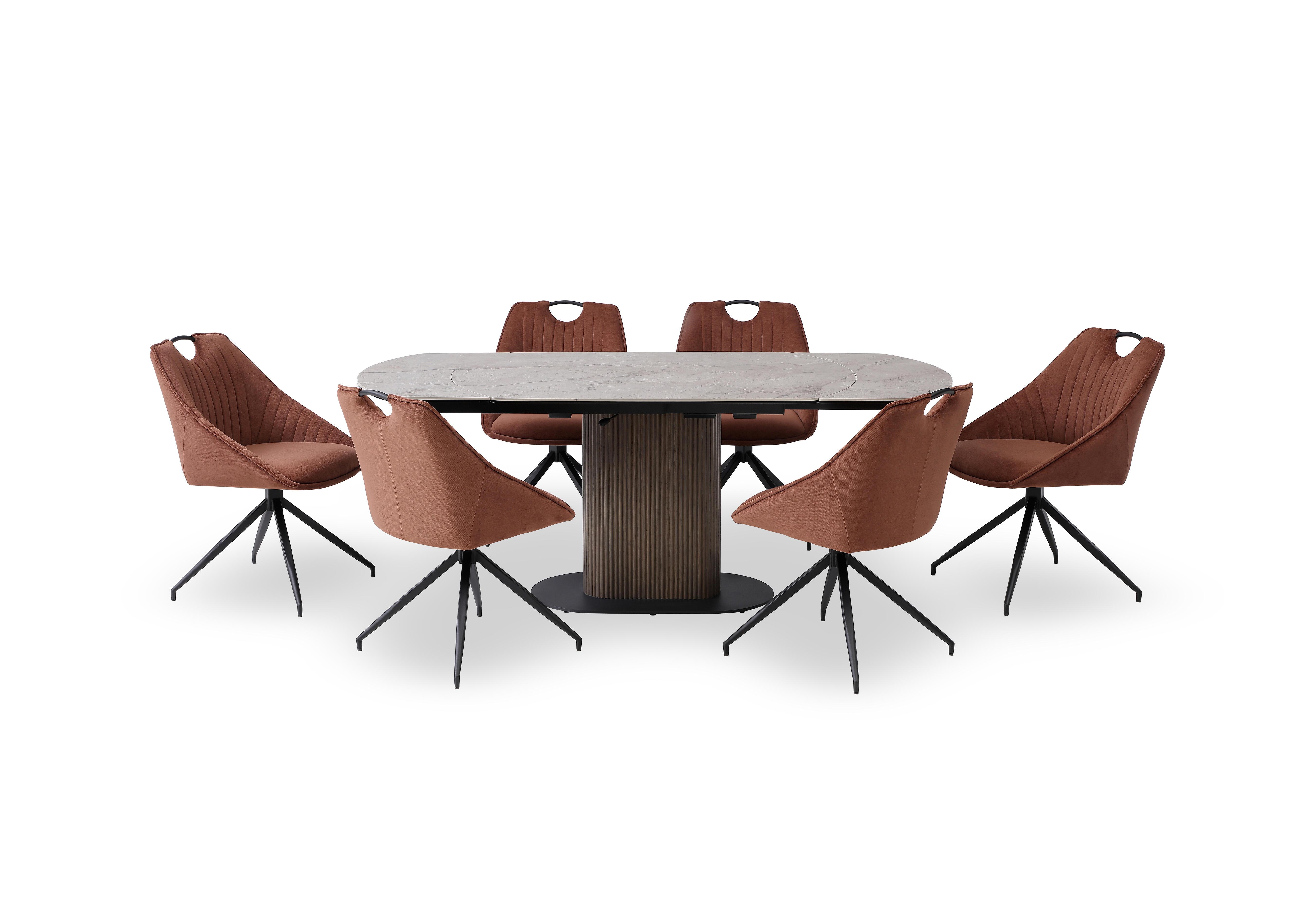 Petra Swivel Extending Dining Table and 6 Swivel Dining Chairs in Rust on Furniture Village