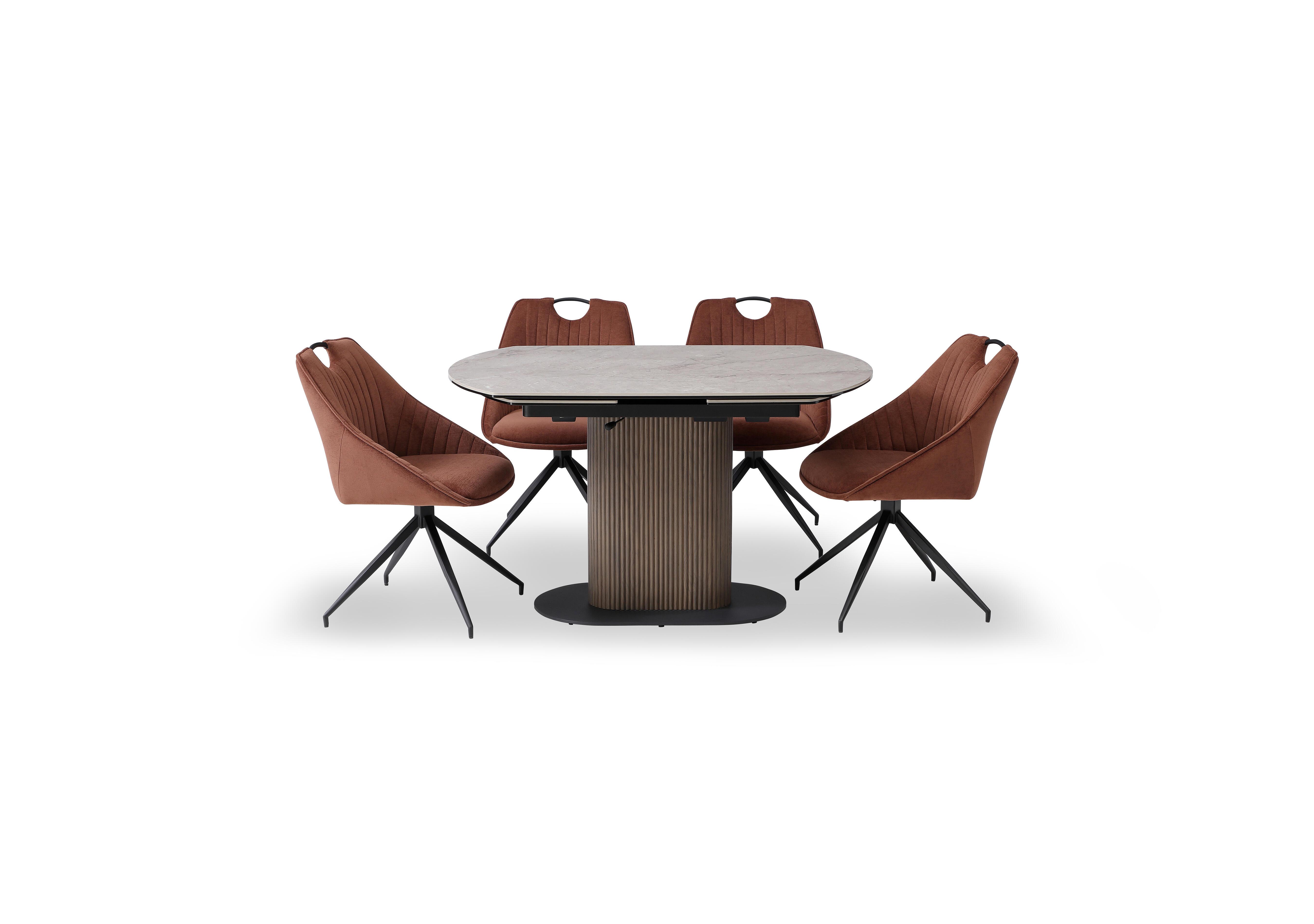 Petra Swivel Extending Dining Table and 4 Swivel Dining Chairs in Rust on Furniture Village