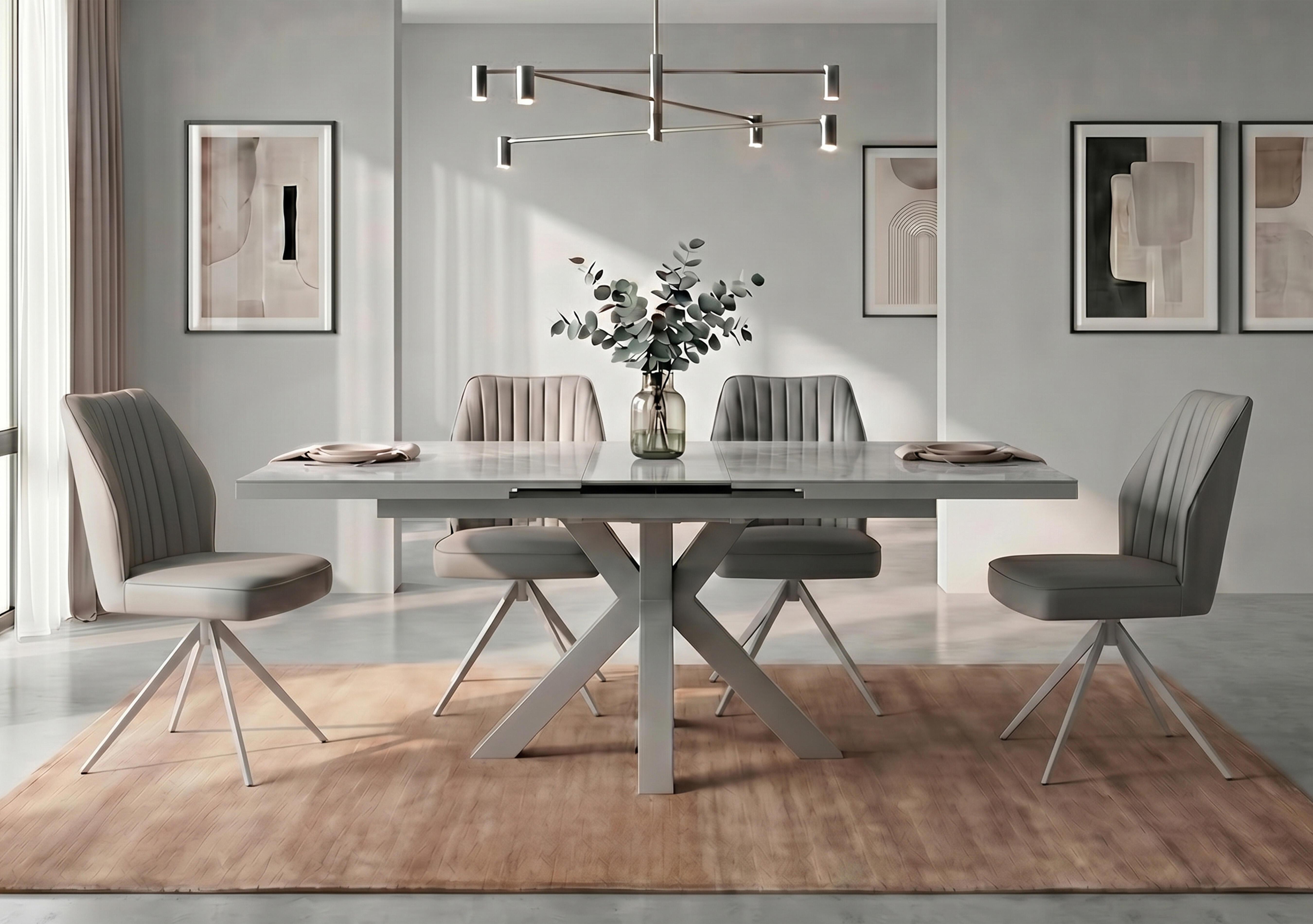 Fumo Pop Up Extending Dining Table and 4 Faux Leather Swivel Dining Chairs in  on Furniture Village