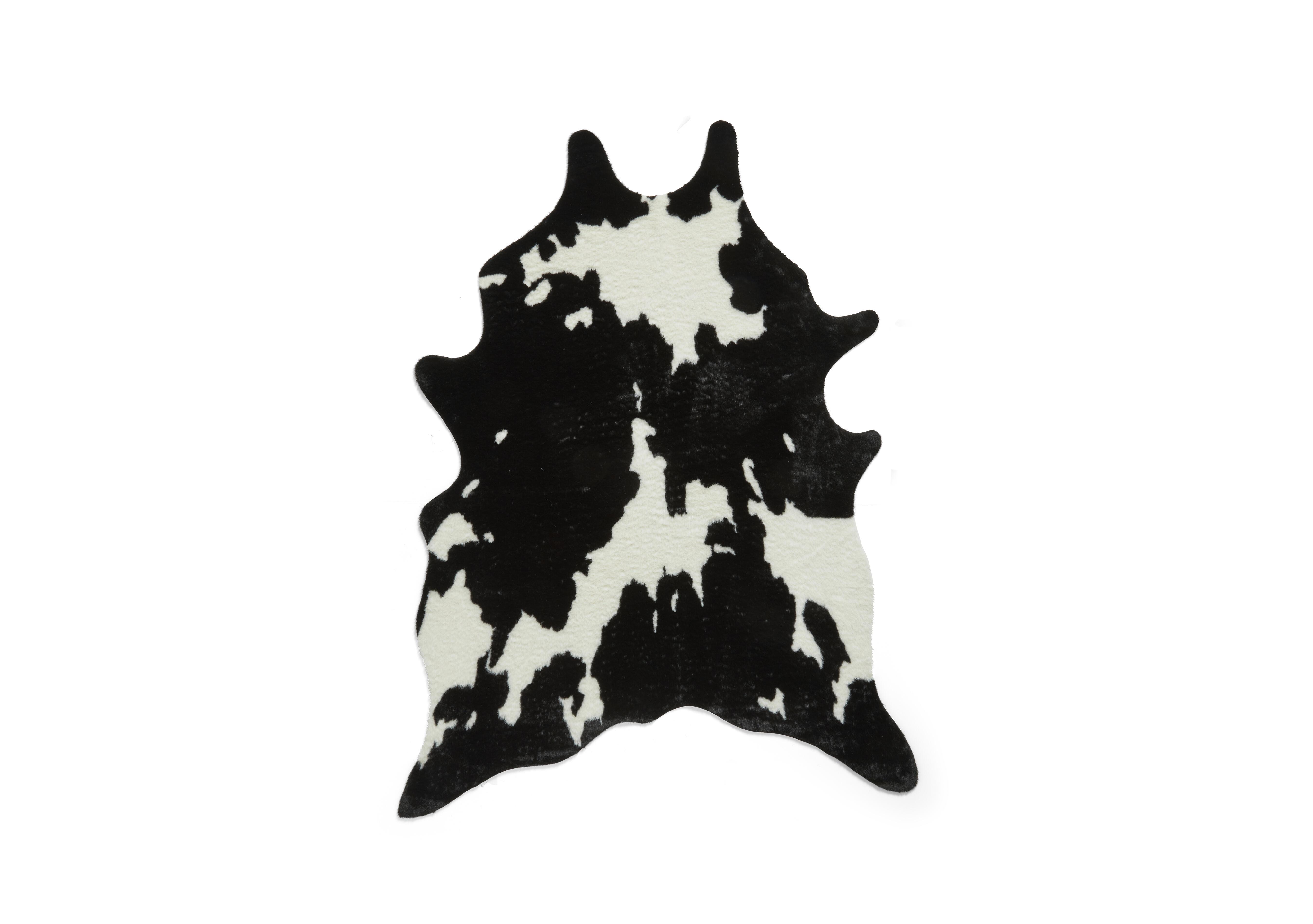 Faux Fur Cow Rug in Black - White on Furniture Village