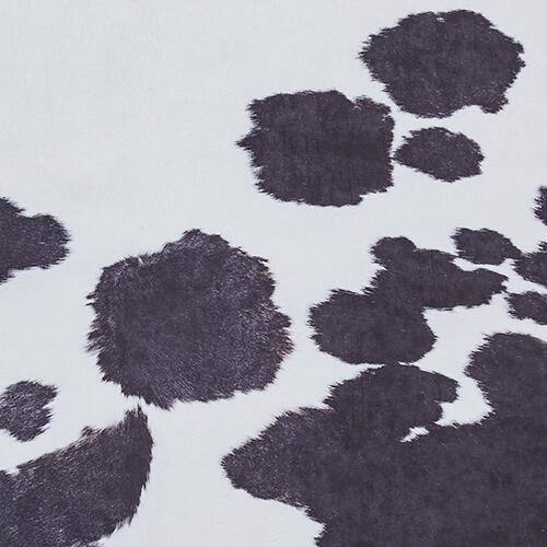 Faux Cow Print Rug in Black - White on Furniture Village