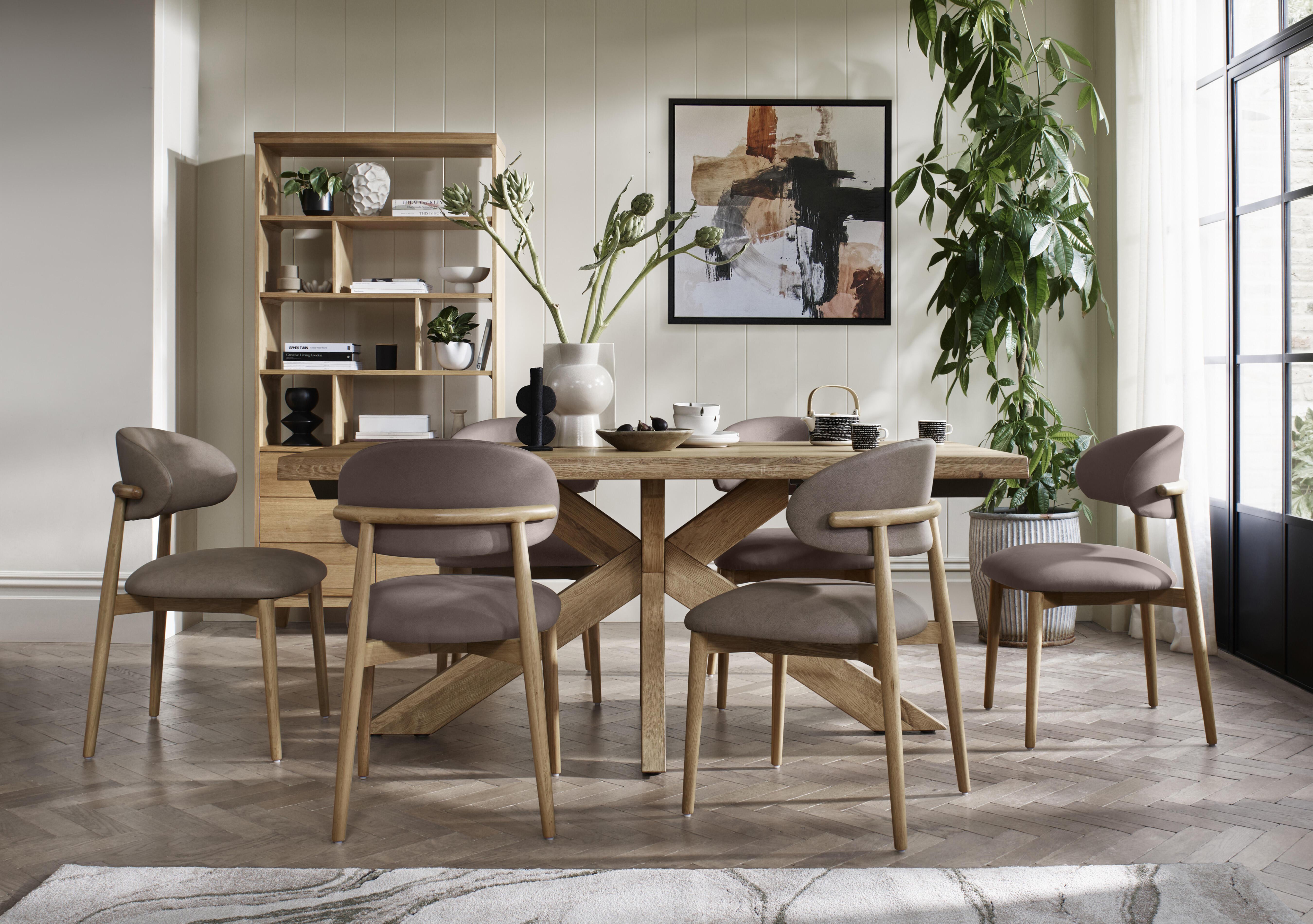 Riga Dining Table with Wooden Star Base and 6 Wooden Dining Chairs in  on Furniture Village