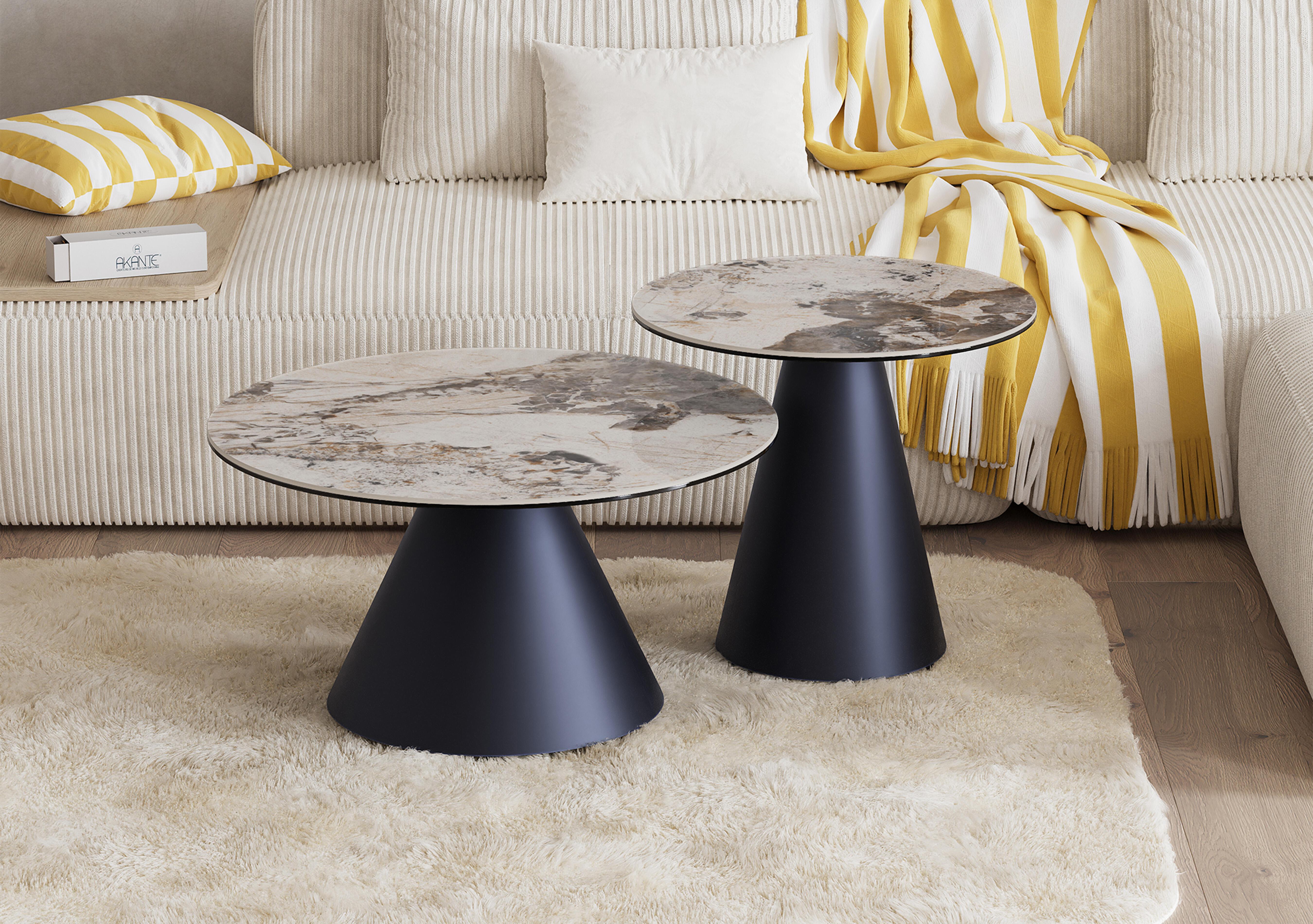 Amorim Round Coffee Table with Black Base in  on Furniture Village