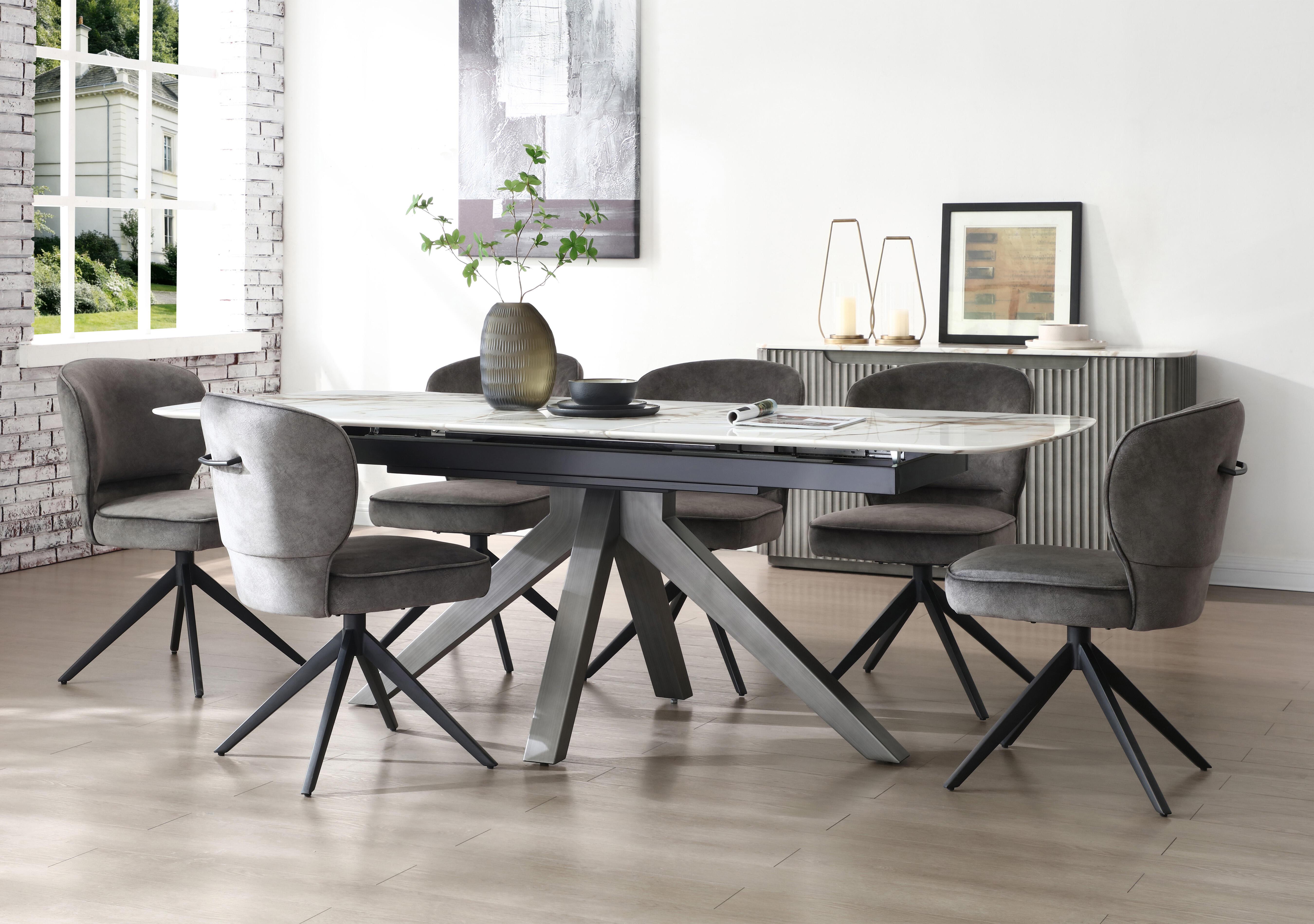 Imperium Pop Up Extending Dining Table and 6 Fabric Swivel Dining Chairs in  on Furniture Village