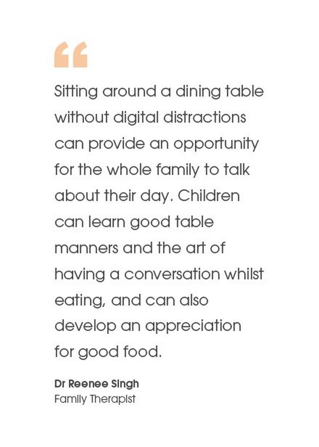 Sitting around a dining table...